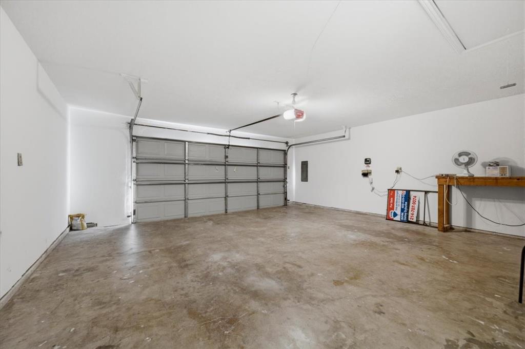 Large garage area  20ft x 21ft - oversized - attic storage above the garage = full sprinkler system  controls in garage