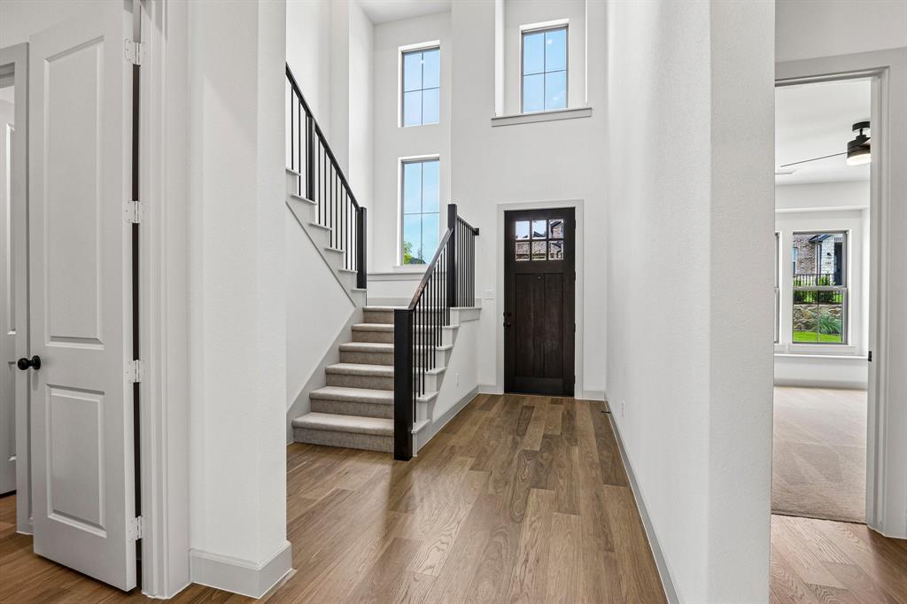 With a dramatic switchback staircase and site lines from the front through to the rear of the home, our Gaston plan is truly your dream home come to life!