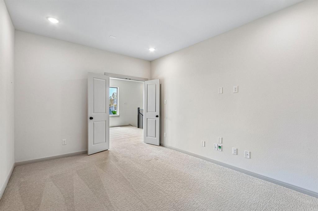 The spacious media room with adjacent game room creates the ultimate family fun zone!