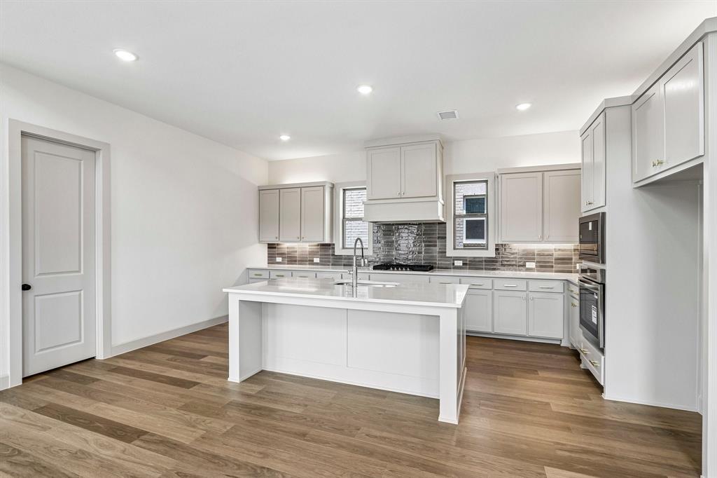 Featuring storage and prep space galore, the chef in the family will love creating culinary masterpieces in this dream kitchen!