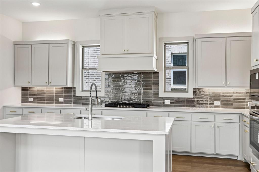 Beautiful cabinetry and gorgeous countertops paired with contemporary stainless steel create the kitchen of your dreams!