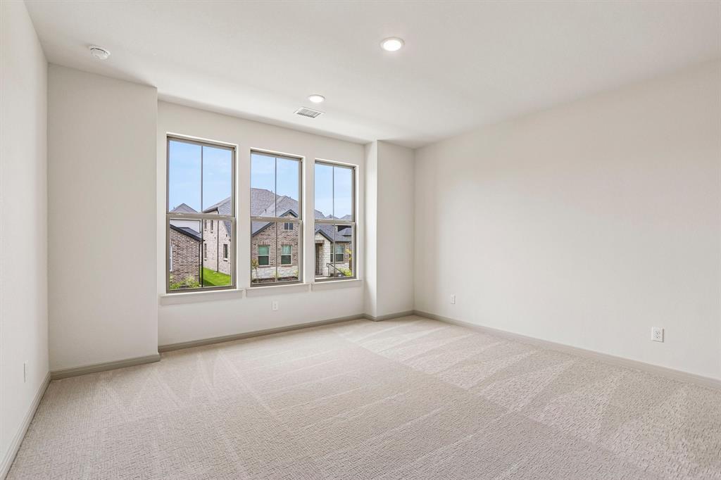 You'll find nicely sized secondary bedrooms in our Gaston plan.