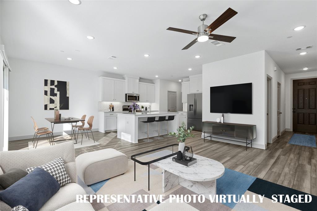 Our Channing plan features an open concept main floor designed for entertaining!  REPRESENTATIVE PHOTO VIRTUALLY STAGED