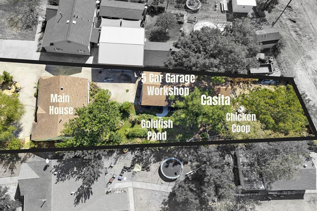 Main house, 5-car garage with workshop, separate casita, goldfish pond, and a chicken coop