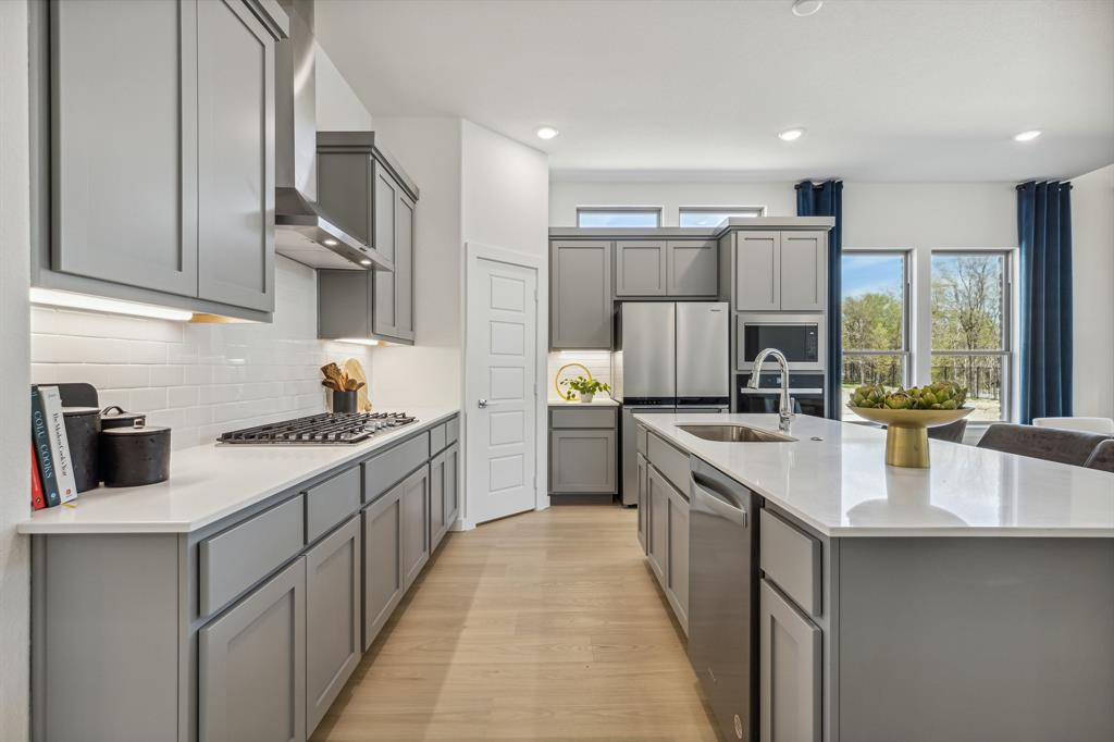 Kitchen in the Van Gogh II home plan by Trophy Signature Homes – REPRESENTATIVE PHOTO Kitchen in the Van Gogh II home plan by Trophy Signature Homes – REPRESENTATIVE PHOTO