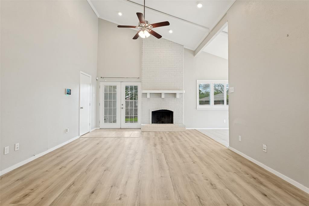 Wood burning fireplace and high ceilings