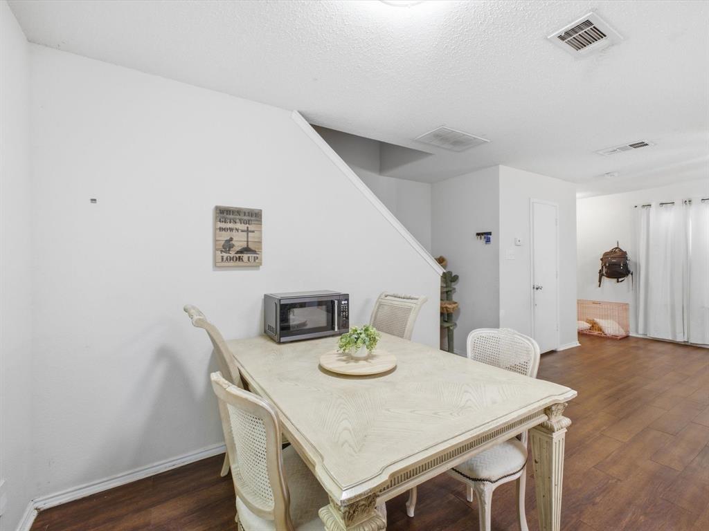 Hardwood-style flooring throughout