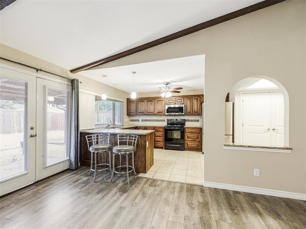 Wood-finish flooring extending into the living area