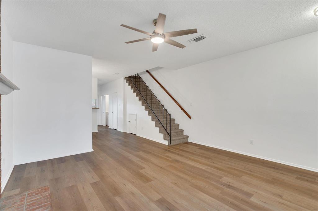 Wood-finish flooring throughout the main level