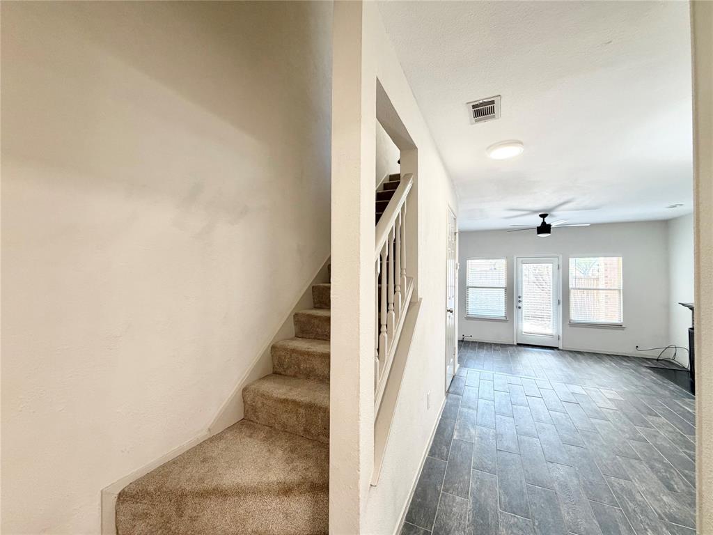 Stairs to bedroom and bathroom