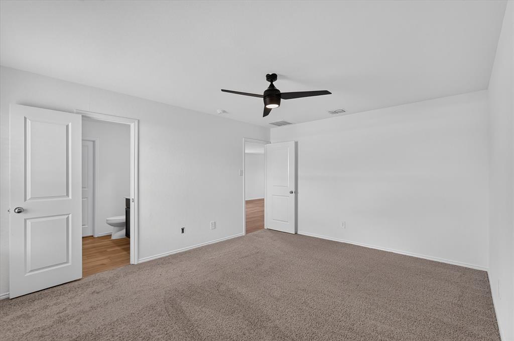 Recessed lighting, ceiling fan, white paneled doors, light brown carpet flooring, wood-finish flooring