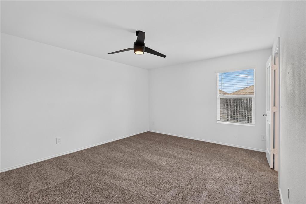 Neutral wall color with carpet flooring