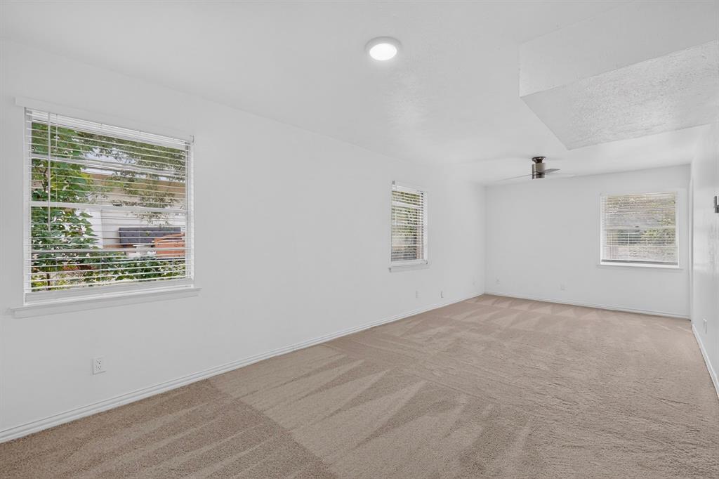 Primary Bedroom with carpet