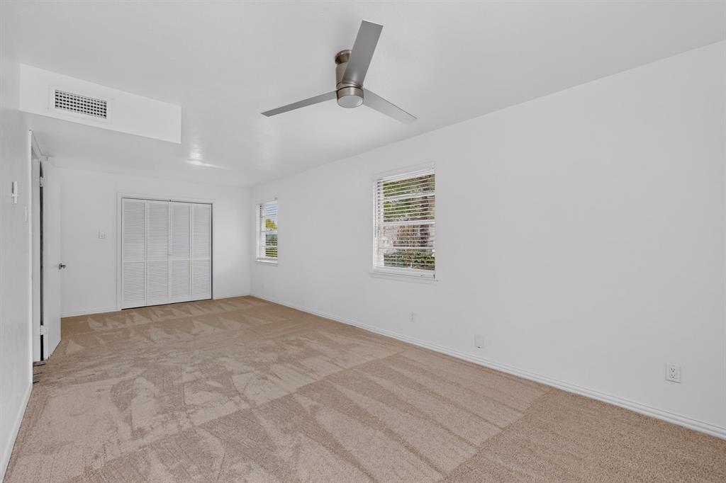 Primary Bedroom with ceiling fan