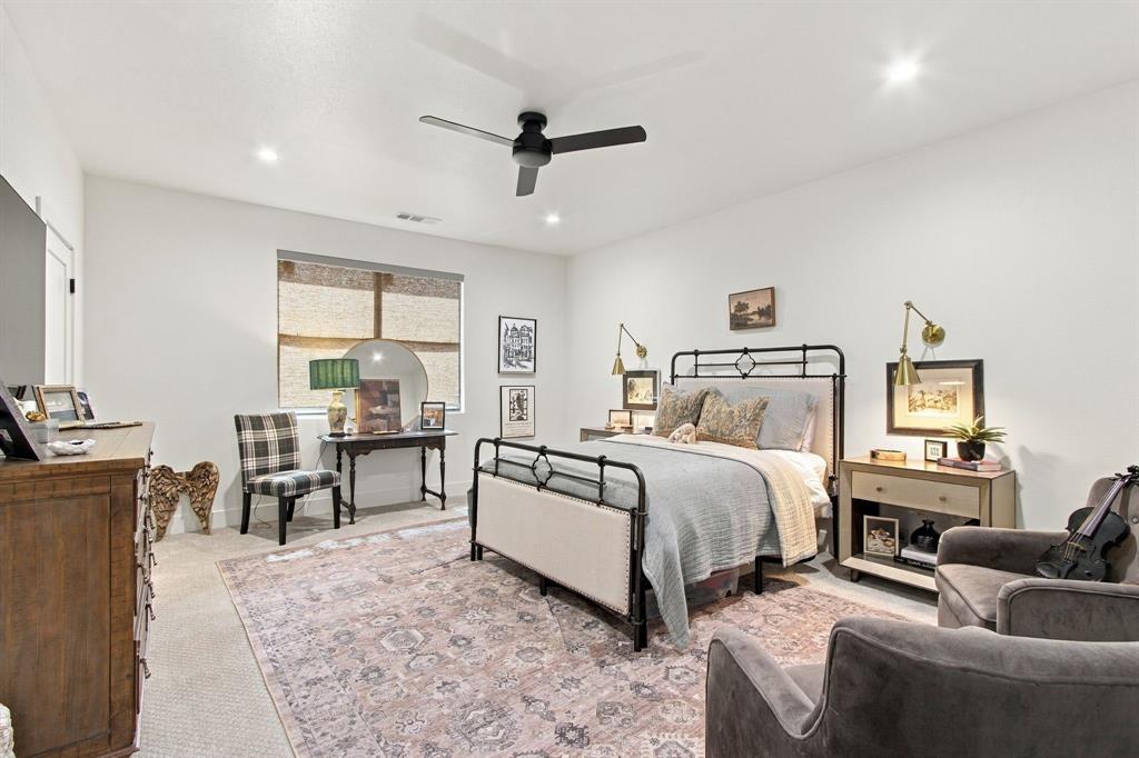 Recessed lighting, ceiling fan, and window with roller shade