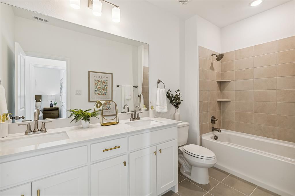 Friends and family will feel right at home in this thoughtfully designed, beautifully finished guest bath.