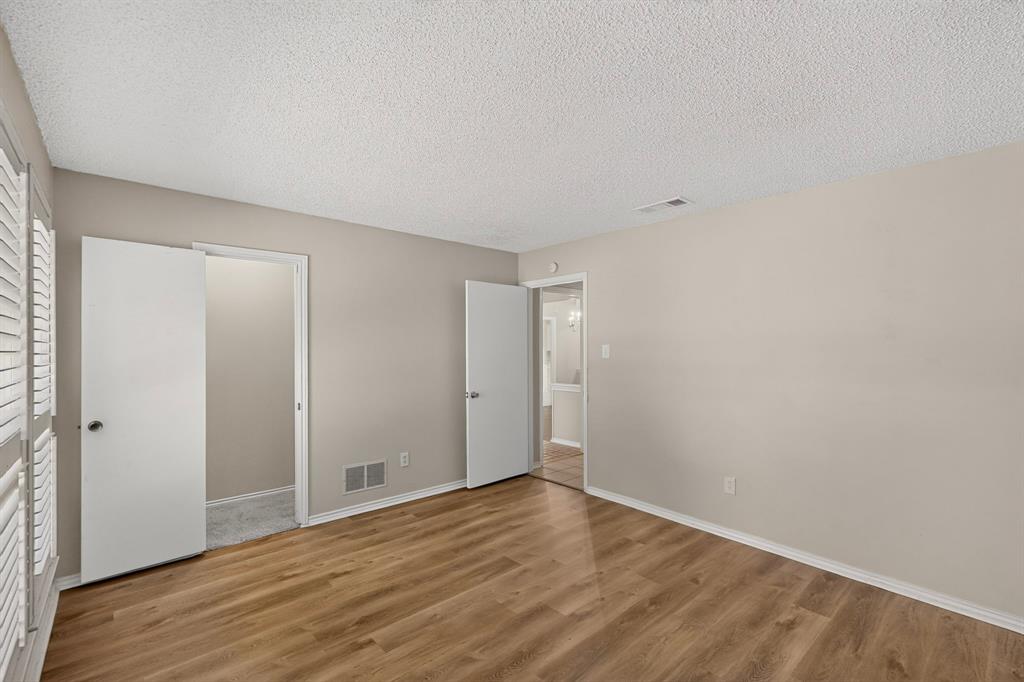 Wood-finish flooring with neutral wall tones