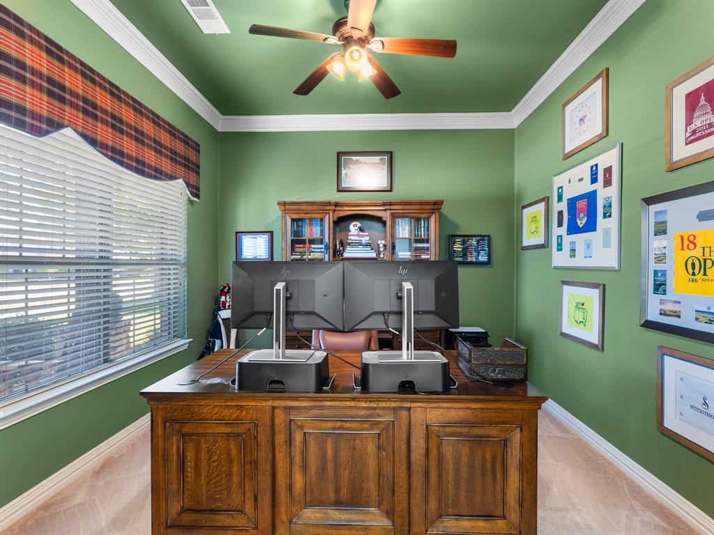 Dedicated office with window overlooking the front yard