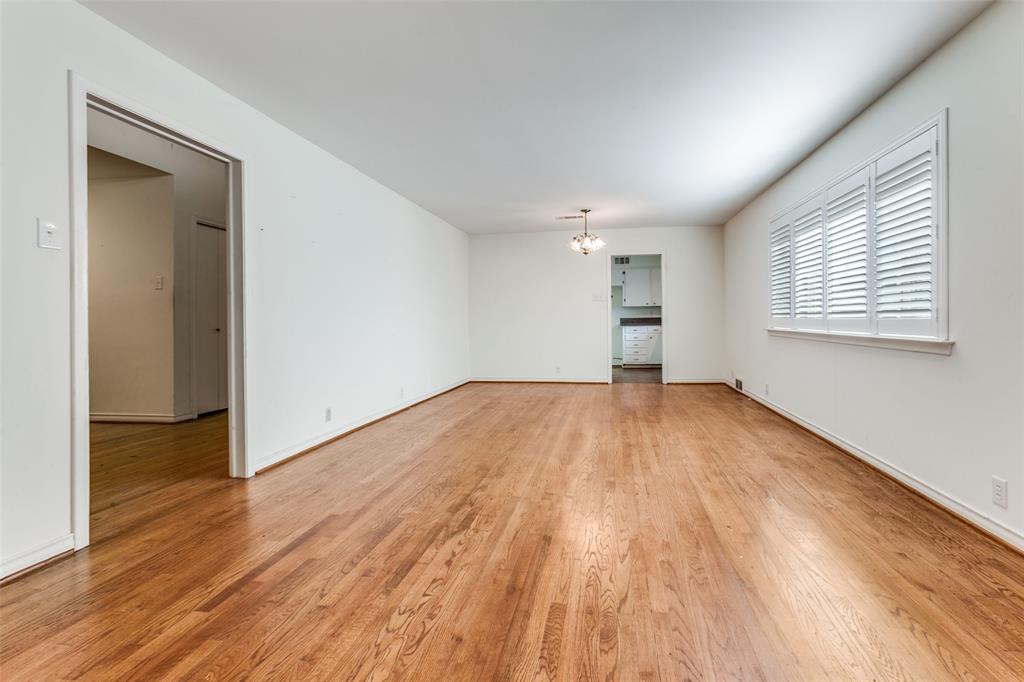Beautiful hardwoods; kitchen in background