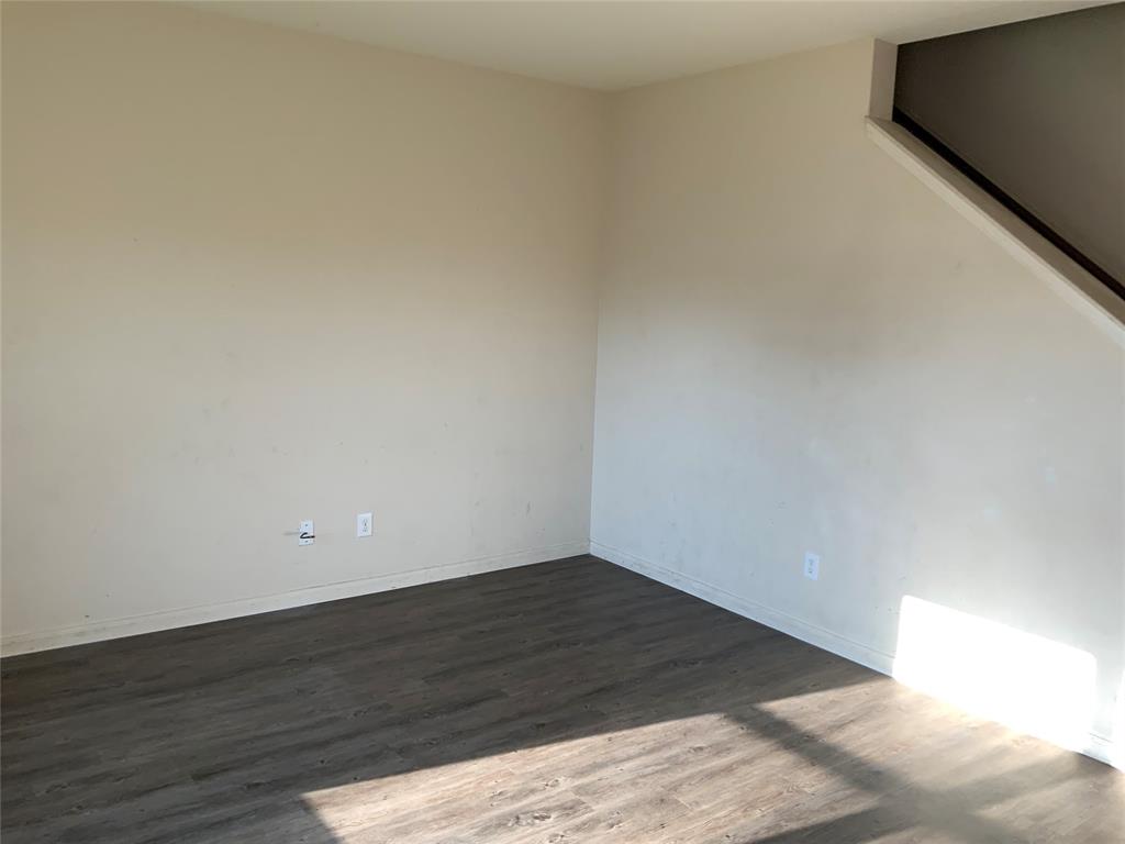 Wood-finish flooring with neutral wall tones Wood-finish flooring with neutral wall tones
