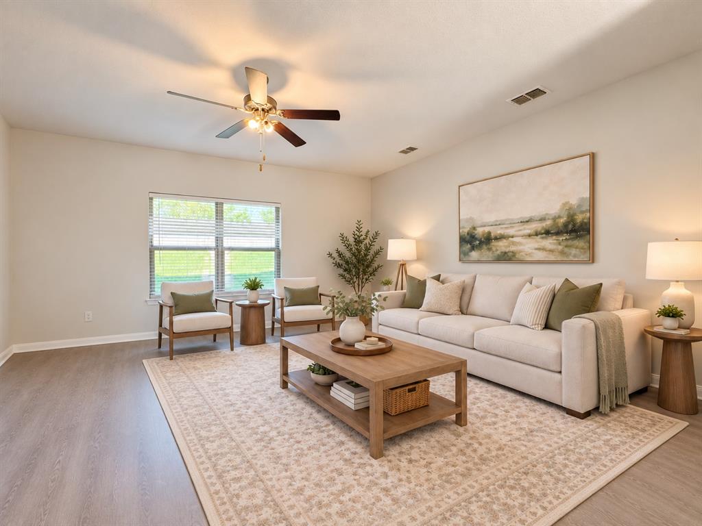 Recessed lighting, wood-finish flooring, ceiling fan, and window with blinds Recessed lighting, wood-finish flooring, ceiling fan, and window with blinds