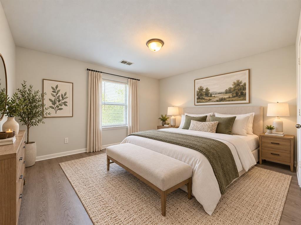 Neutral wall tones, recessed lighting, expansive window with blinds, wood-finish flooring, and a flush mount ceiling fixture Neutral wall tones, recessed lighting, expansive window with blinds, wood-finish flooring, and a flush mount ceiling fixture