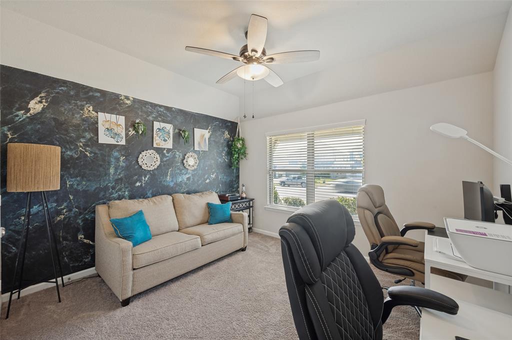 Recessed lighting and ceiling fan overhead