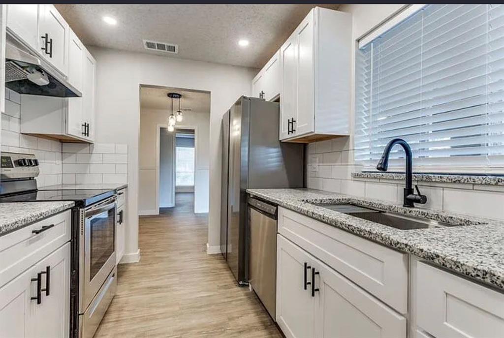 1606 Travis Street, Garland, TX 75042