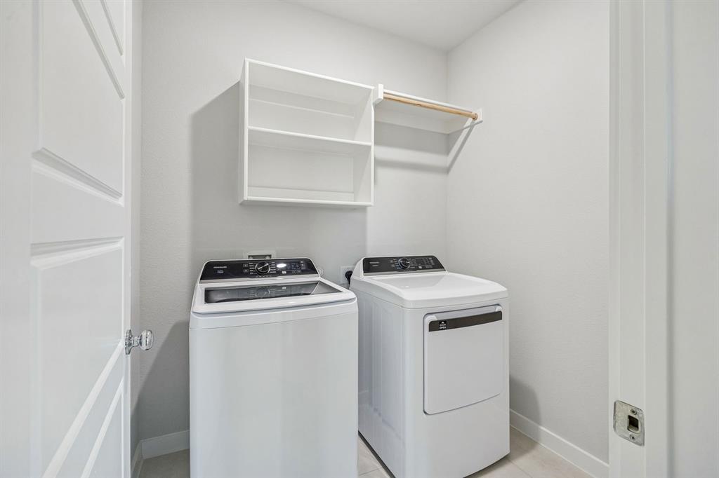 Utility Room in the Stanley II home plan by Trophy Signature Homes – REPRESENTATIVE PHOTO