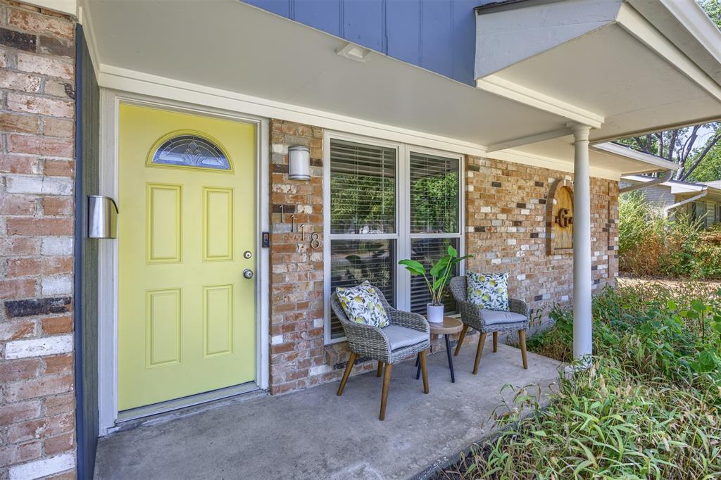 Brick exterior with an inviting covered porch
