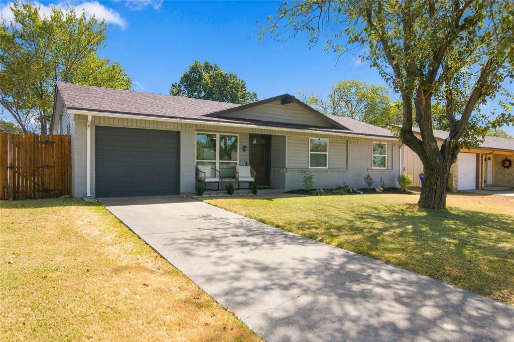 Single-story residence featuring a two-car garage, concrete driveway, and a front porch Single-story residence featuring a two-car garage, concrete driveway, and a front porch
