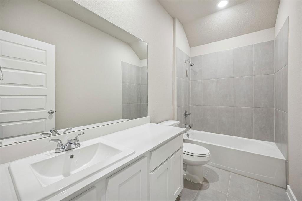 Bathroom in the Wimbledon home plan by Trophy Signature Homes – REPRESENTATIVE PHOTO