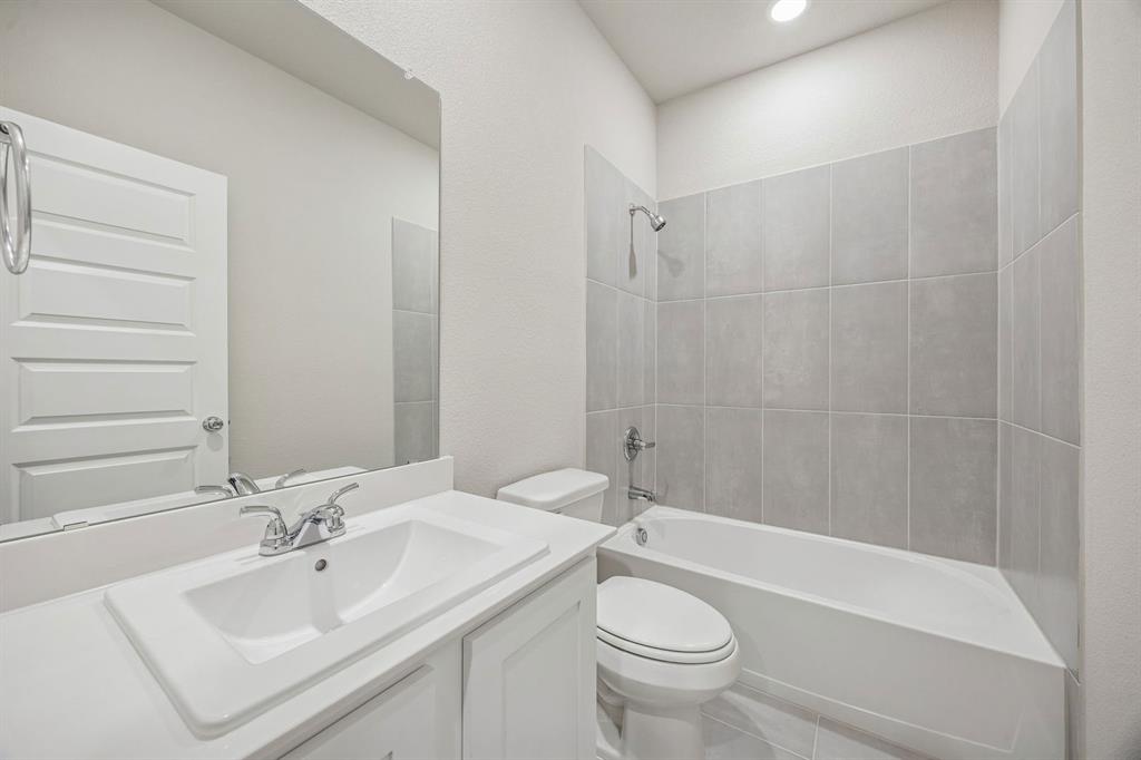 Bathroom in the Wimbledon home plan by Trophy Signature Homes – REPRESENTATIVE PHOTO
