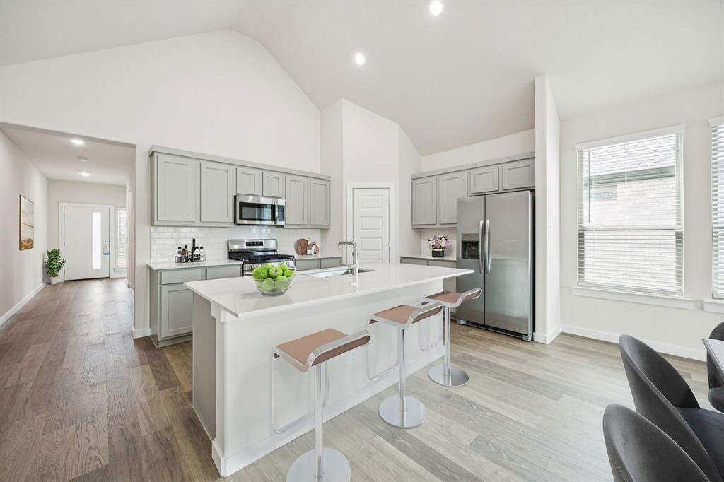 Kitchen in the Claret home plan by Trophy Signature Homes – REPRESENTATIVE PHOTO Kitchen in the Claret home plan by Trophy Signature Homes – REPRESENTATIVE PHOTO