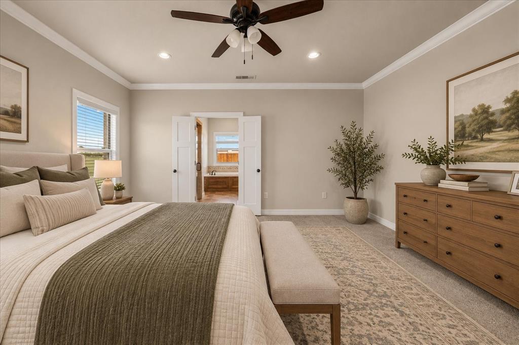 Recessed lighting, ceiling fan, crown molding, double doors, and a window with blinds