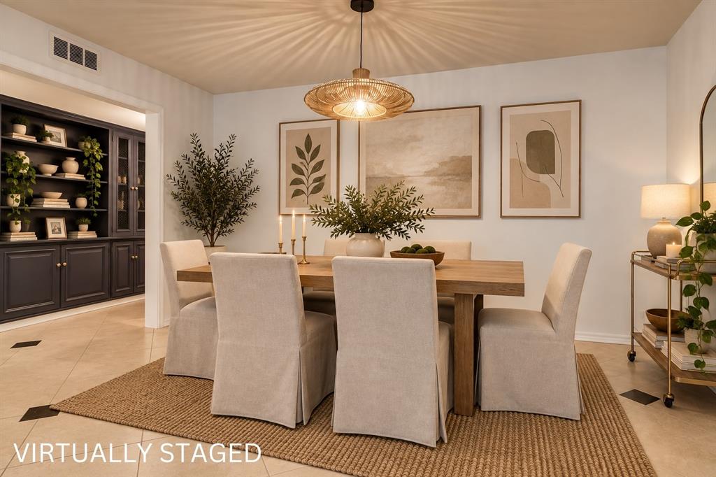 Recessed lighting, tiled flooring, built-in shelving with glass-front cabinetry, and a woven pendant light fixture