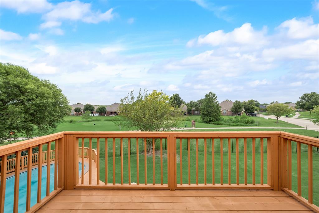 View overlooking the pool and Golf Course from the 2nd level of the deck