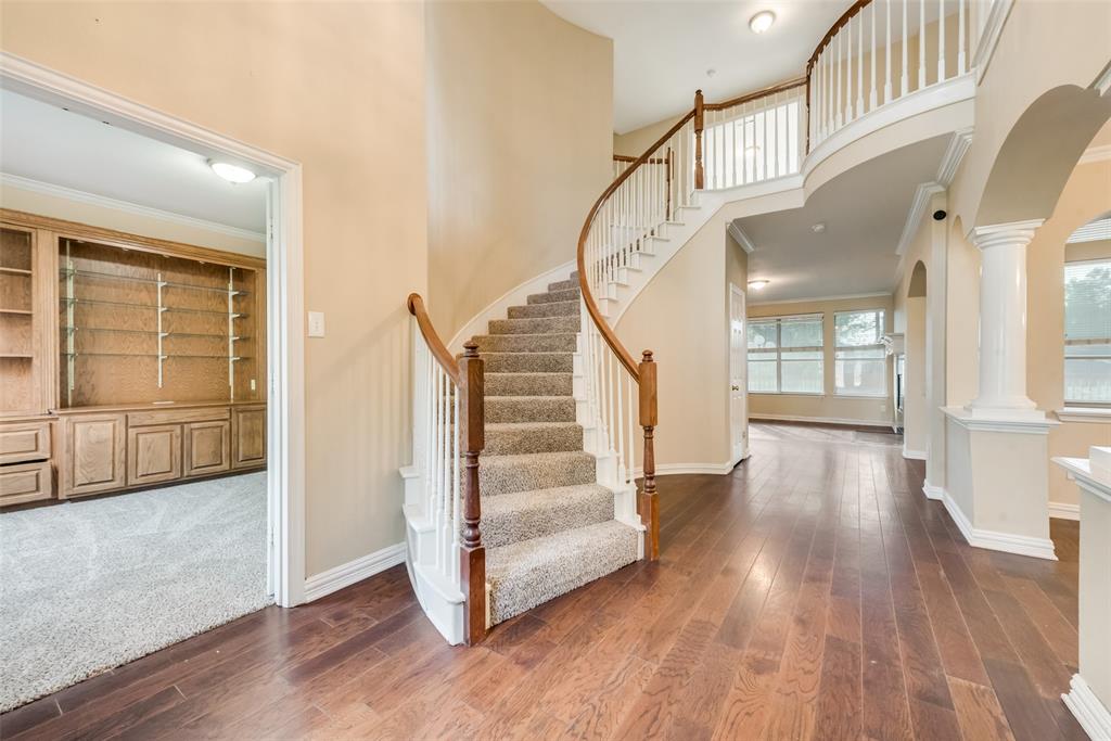 Elegant and Grand Staircase, just off the study.