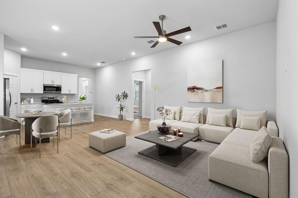 Living Room in the Cypress home plan by Trophy Signature Homes - REPRESENTATIVE PHOTO