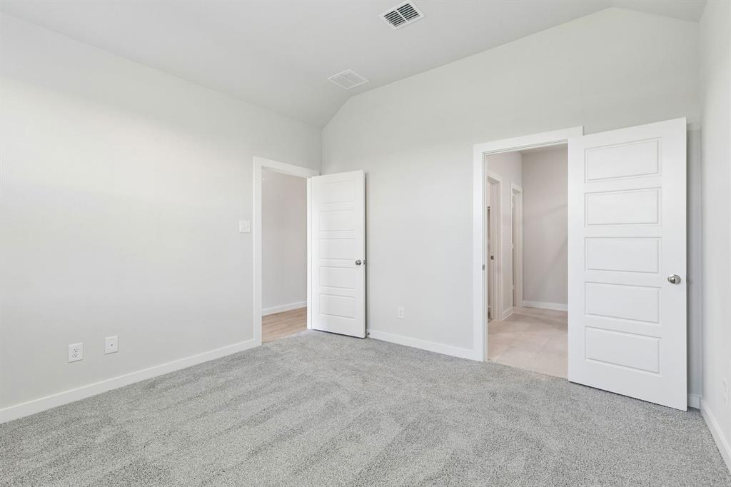 Primary Suite in the Cypress home plan by Trophy Signature Homes - REPRESENTATIVE PHOTO