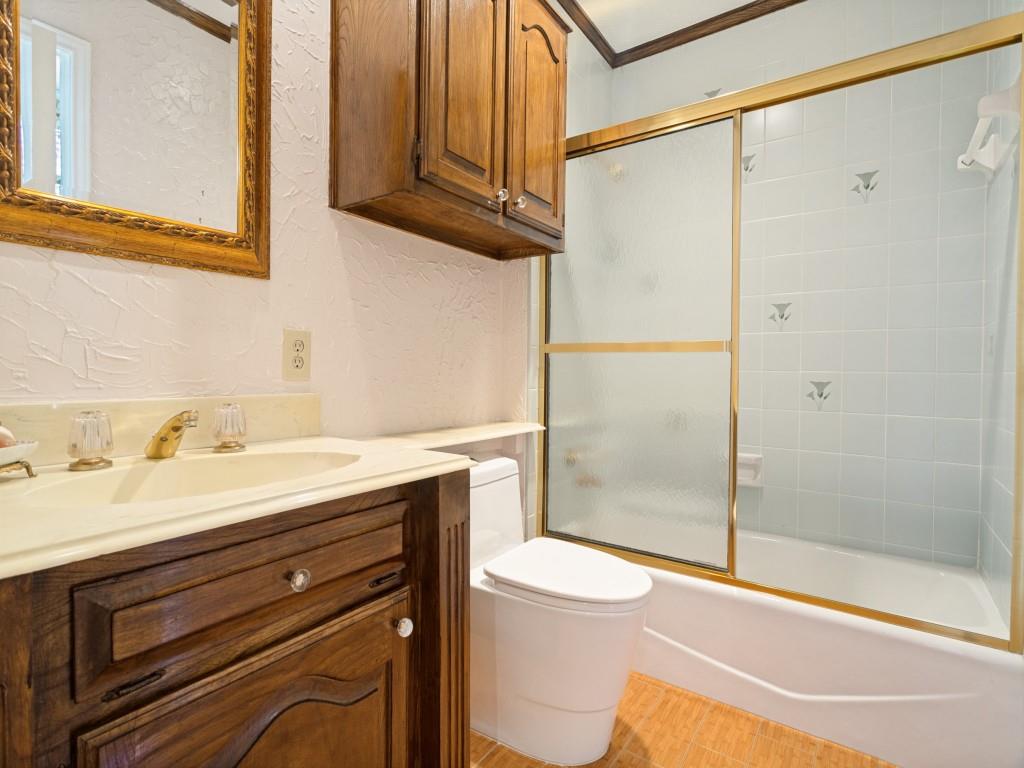 The bathroom is attached to the library