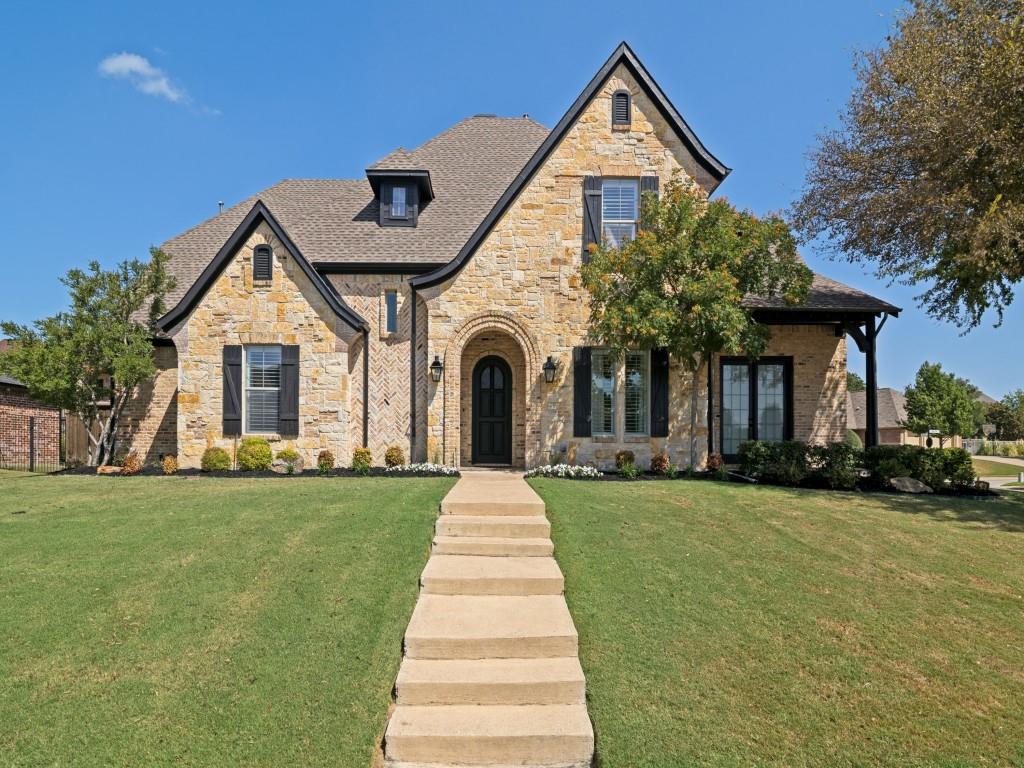 Gorgeous curb appeal to this custom home with stone and brick exterior! Gorgeous curb appeal to this custom home with stone and brick exterior!