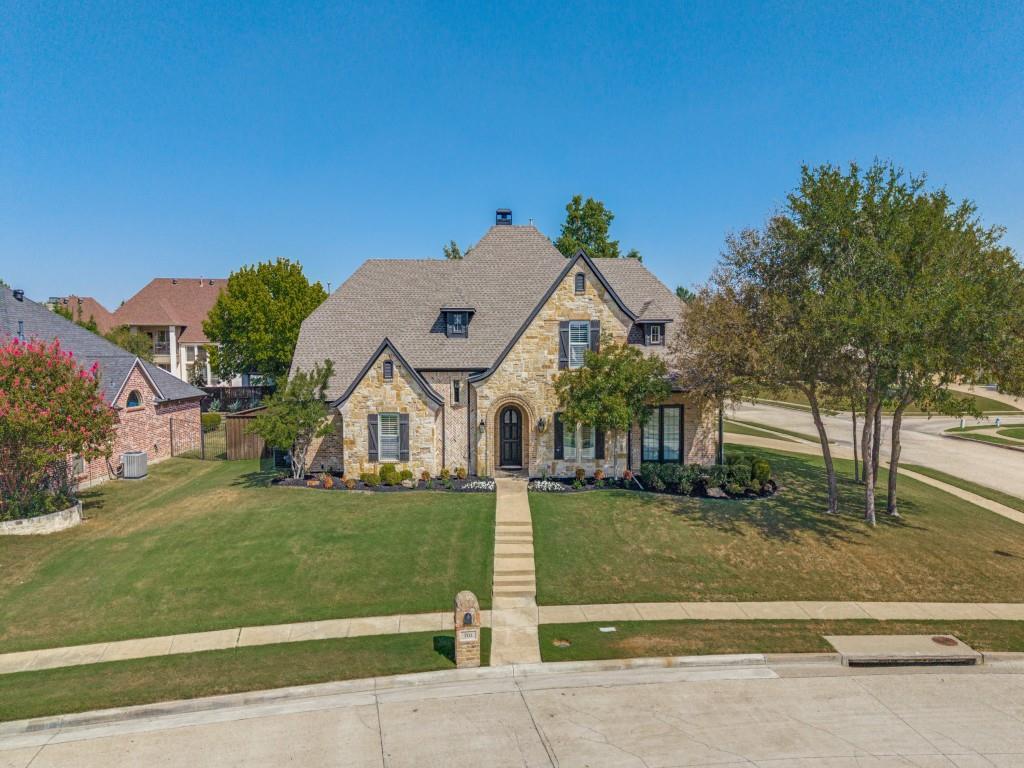 Corner lot with mature trees and landscaping