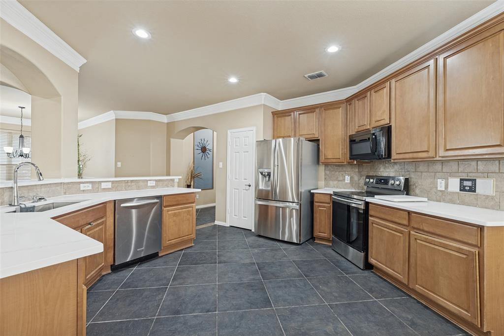 Kitchen featuring, stainless steel appliances and ample cabinets