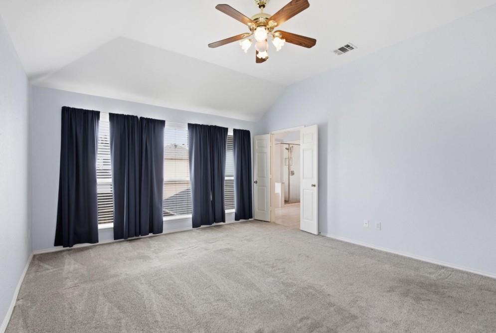 Vaulted ceiling with an attached ceiling fan