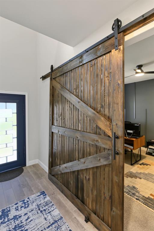 With barn doors leading into the office