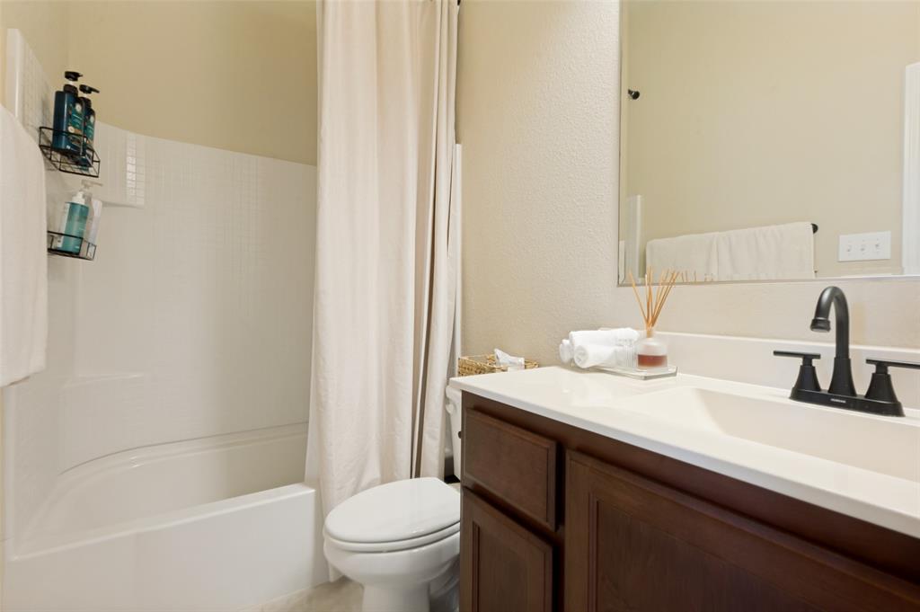 Tub and shower combination with white surround