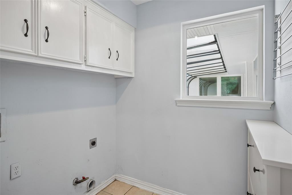 A barn door opens from the family room to the laundry room.