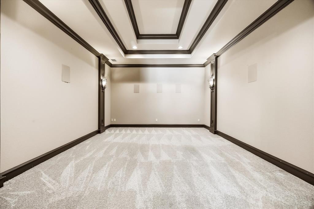Downstairs Media/Theather. 1 of 5 living iin Main Home