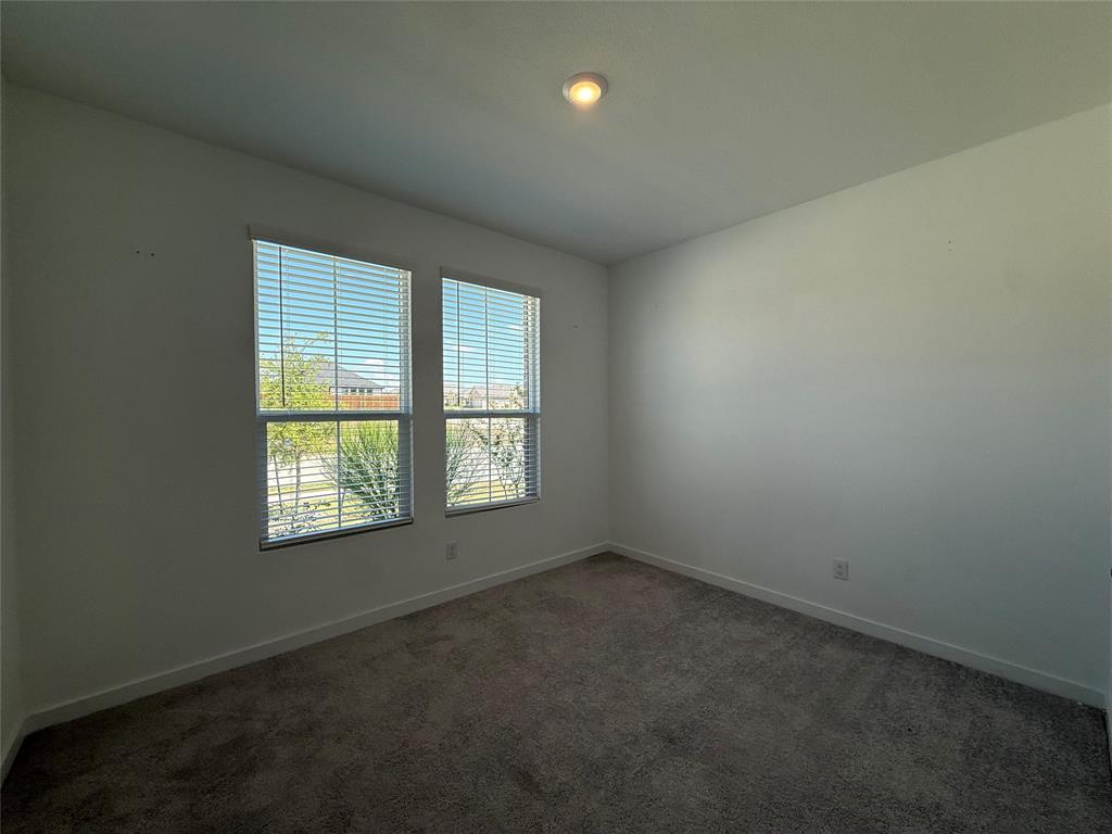 Two windows with integrated blinds